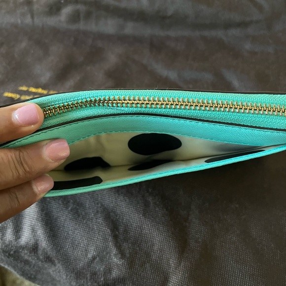 Kate spade tote with inside zipper pocket and two pockets on other side. - Picture 14 of 14